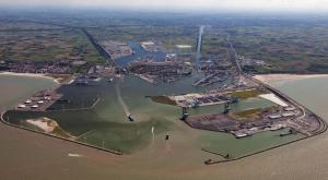 a view of a body of water with a mountain in the background