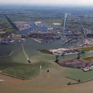 a view of a body of water with a mountain in the background