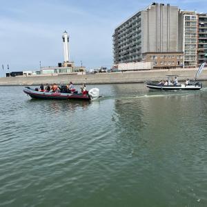 a small boat in a large body of water
